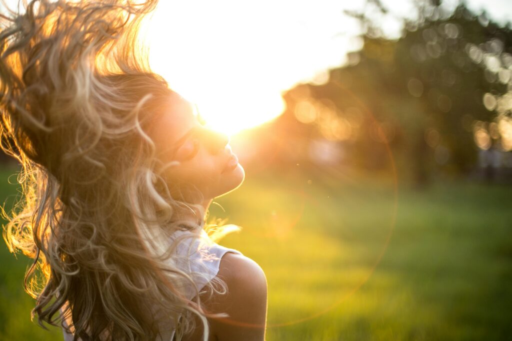 GIRL FLAUNTING HER LONG HAIR 